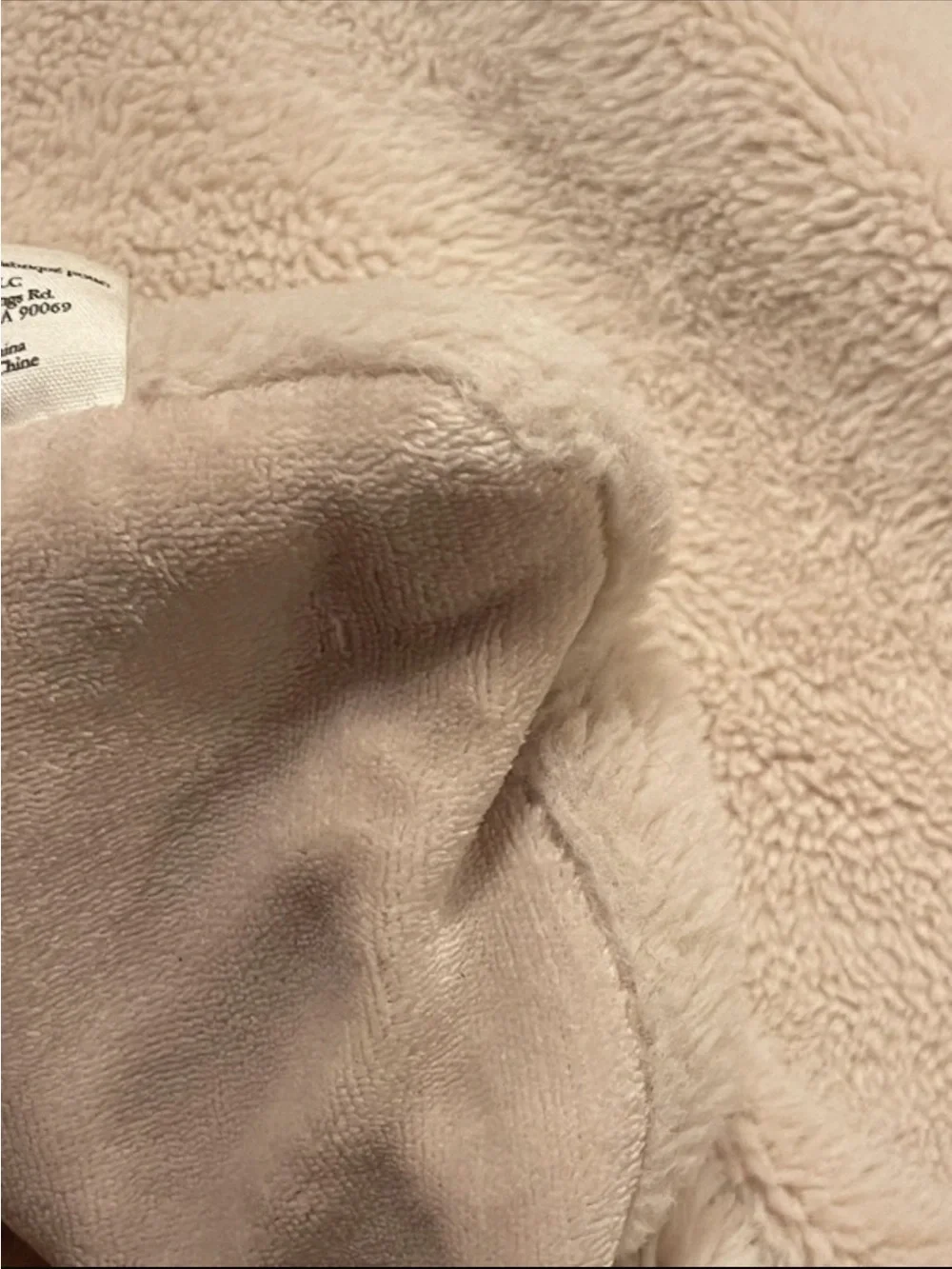 UnHide blanket in cream 60 by 80